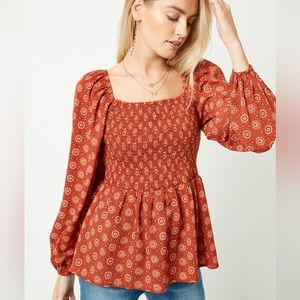 NWT Hayden Puff Sleeve Smocked Peplum Top size Large in rust color